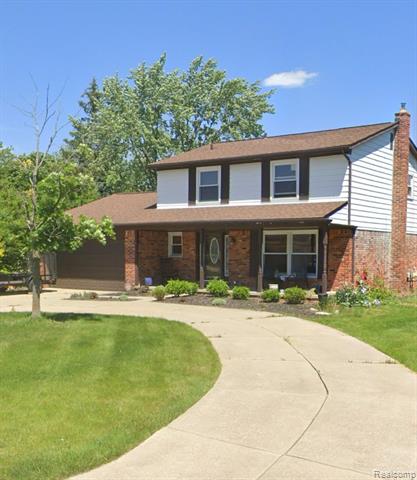 front view picture of 27078 Arden Park Cir, Farmington, MI. 48334