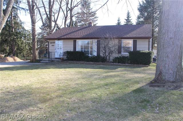 front view picture of 7425 Ann Arbor Street, Dexter, MI. 48130