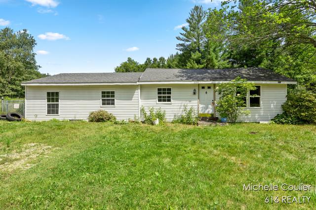 front view picture of 9583 E 5 Mile Road, Big Rapids, MI. 49307
