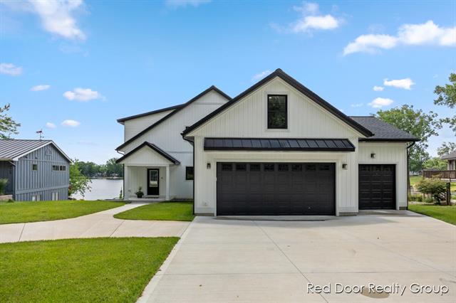 front view picture of 7956 Island Court, Stanwood, MI. 49346