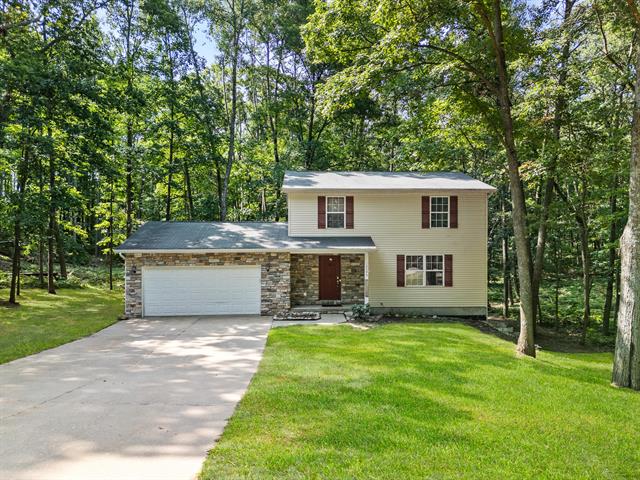 front view picture of 12095 Dubois Drive, Stanwood, MI. 49346