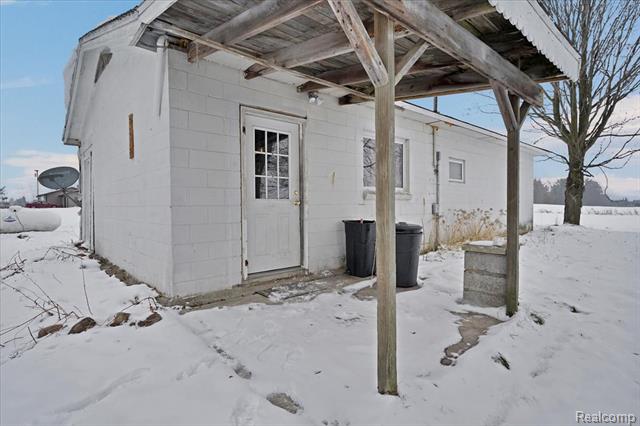 front view picture of 8858 Willits Road, Mayville, MI. 48744