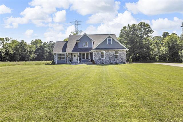 front view picture of 9430 Island Lake Road, Dexter, MI. 48130
