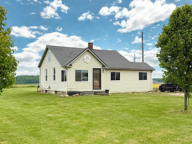 front view picture of 11250 W Bristol Road, Lennon, MI. 48449
