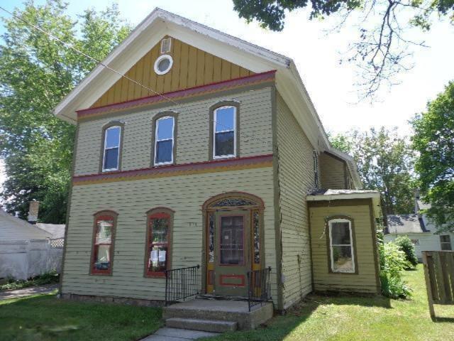 front view picture of 215 W Grove Street, Greenville, MI. 48838