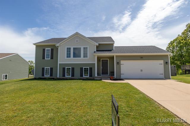 front view picture of 709 Wild Flower Drive, Wayland, MI. 49348
