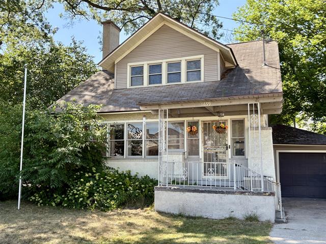 front view picture of 1699 Sanford Street, Muskegon, MI. 49441