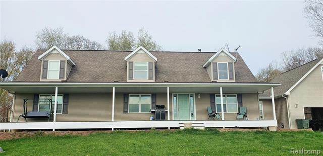 front view picture of 11699 W Iosco Road, Webberville, MI. 48892