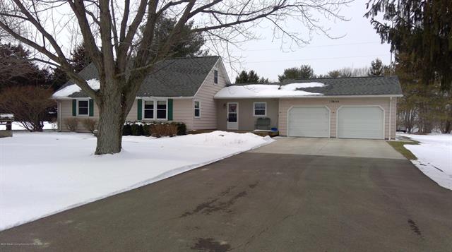 front view picture of 13830 S Grange Road, Eagle, MI. 48822