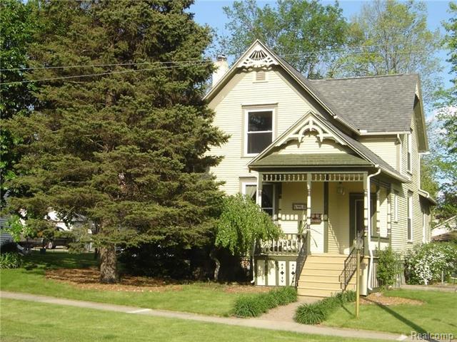 front view picture of 421 S Walnut Street, Howell, MI. 48843