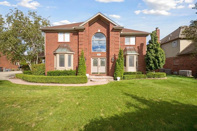 front view picture of 40448 Emerald Lane W., Clinton Township, MI. 48038