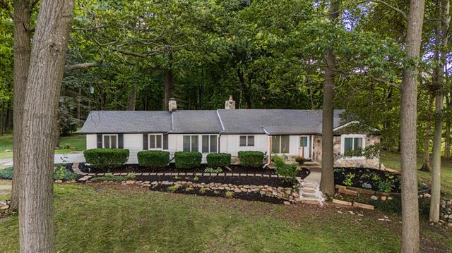 front view picture of 7020 Pontiac Trail, South Lyon, MI. 48178
