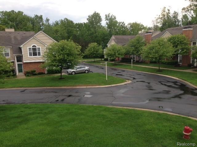 front view picture of 56150 Chesapeake Trail, Shelby Township, MI. 48316