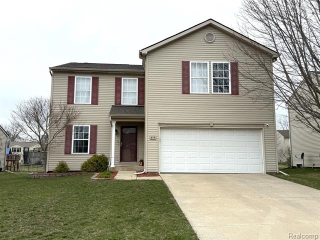 front view picture of 879 Prairie, Milan, MI. 48160