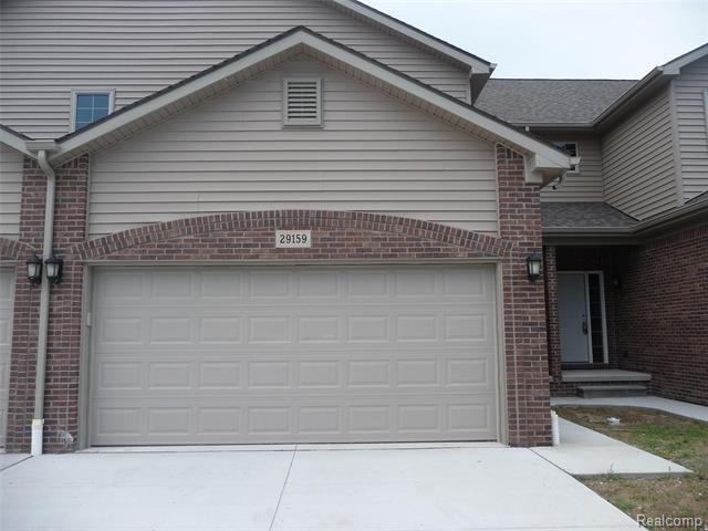 front view picture of 29159 Timber Woods Drive, New Baltimore, MI. 48047