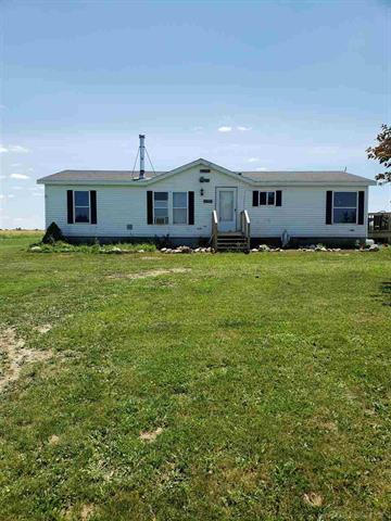 front view picture of 8652 Peck Road, Marlette, MI. 48453