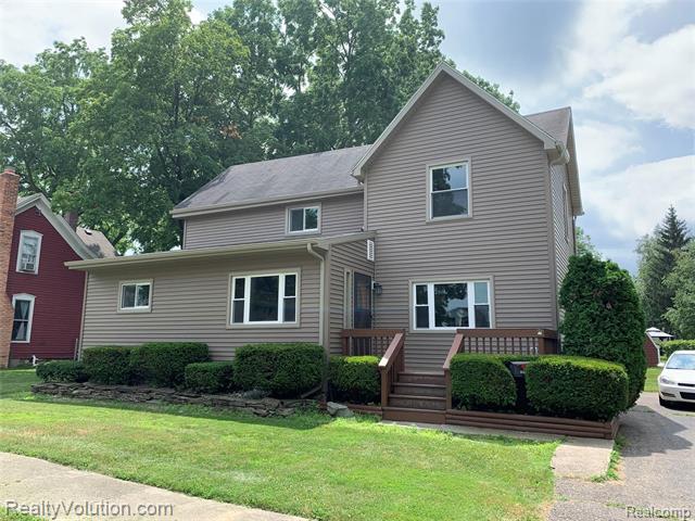 front view picture of 245 6Th Street, Imlay City, MI. 48444