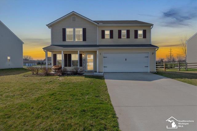 front view picture of 891 Rabbit Run Road, Carleton, MI. 48117