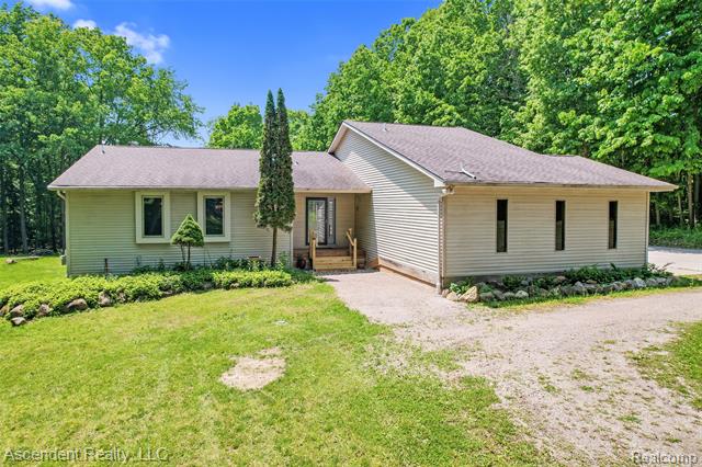 front view picture of 5735 Belle River Road, Attica, MI. 48412