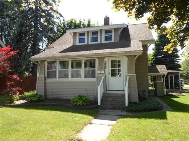 front view picture of 233 Dexter, Milan, MI. 48160