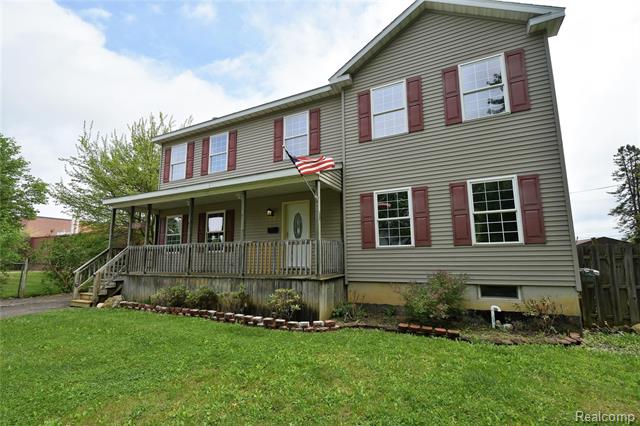 front view picture of 3853 N Mill Road, Dryden, MI. 48428