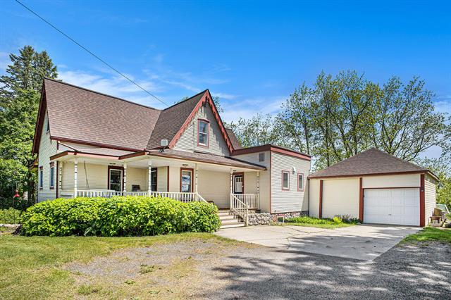 front view picture of 20437 Sager Road, Chelsea, MI. 48118