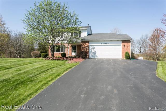 front view picture of 11094 Shadow Woods Lane, Whitmore Lake, MI. 48189