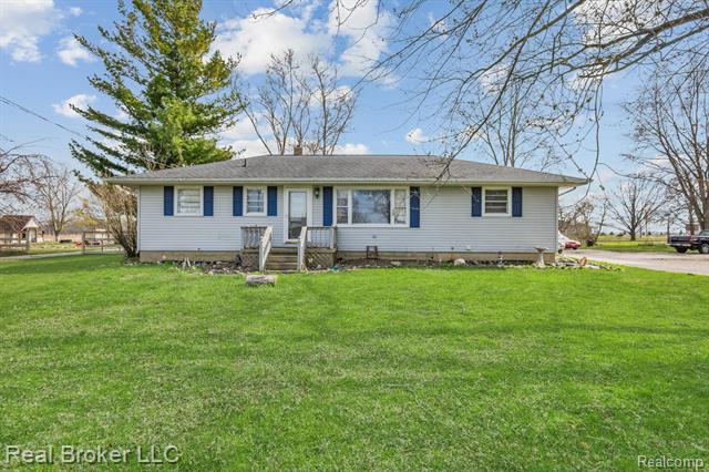 front view picture of 3983 Peet Road, New Lothrop, MI. 48460