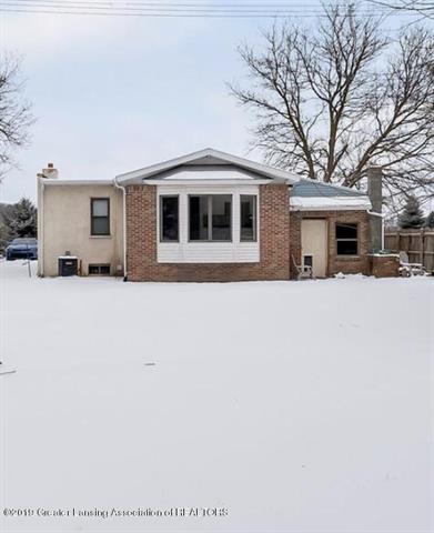 front view picture of 3039 Meridian Road, Okemos, MI. 48864