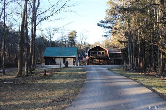 front view picture of 12175 Powderhorn Trail, Otisville, MI. 48463