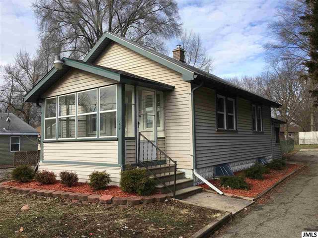 front view picture of 164 Cross St, Michigan Center, MI. 49254