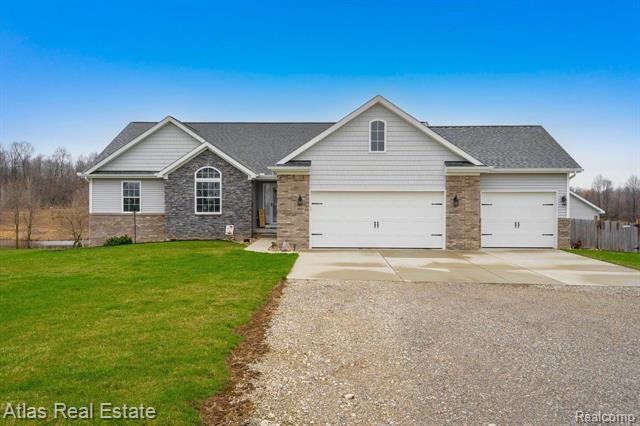 front view picture of 5053 Hidden Ridge Drive, Metamora, MI. 48455