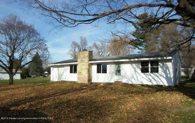 front view picture of 321 Monroe Street, Webberville, MI. 48892