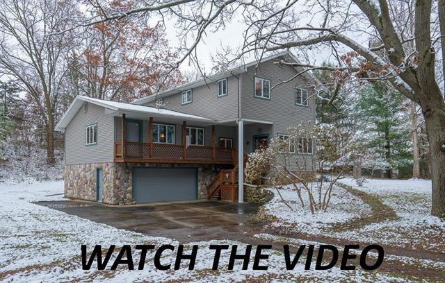 front view picture of 4229 E Cedar Lake, Chelsea, MI. 48118