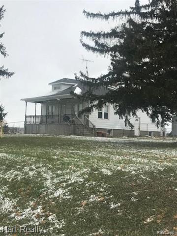 front view picture of 633 S Van Dyke Road, Marlette, MI. 48453