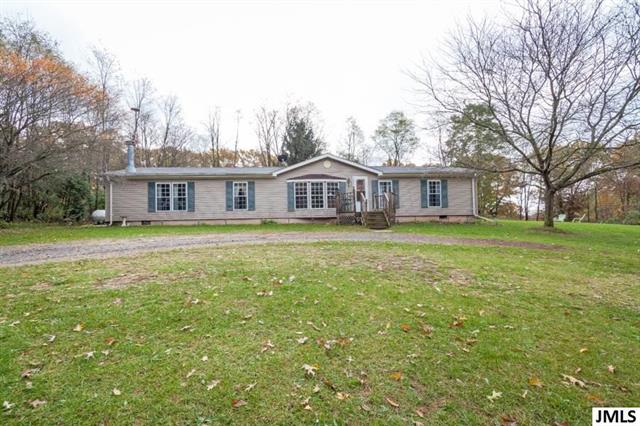 front view picture of 14148 Peckham Rd, Parma, MI. 49269