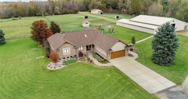 front view picture of 9552 Wall Gene Road, South Lyon, MI. 48178