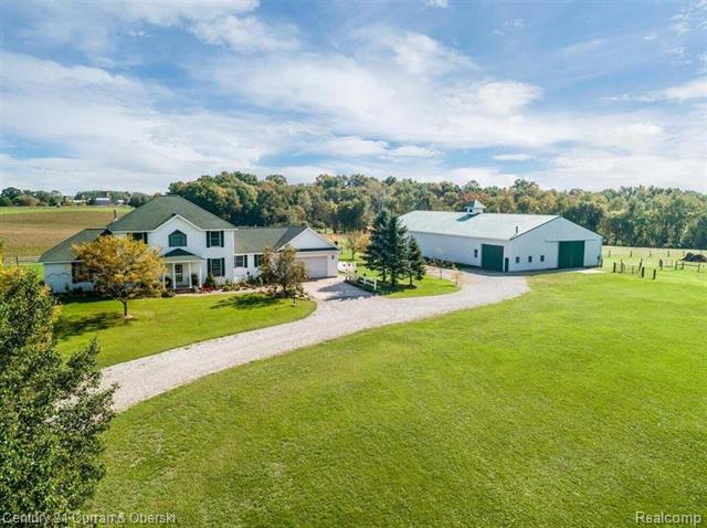 front view picture of 3443 Grey Tower Road, Jackson, MI. 49201