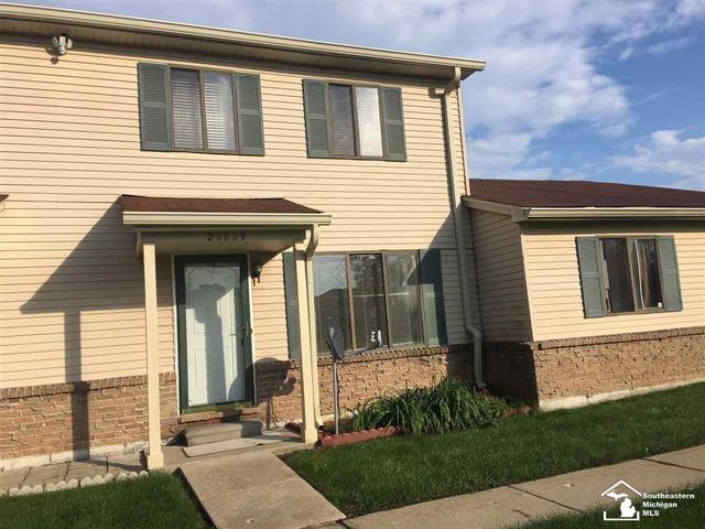 front view picture of 20009 Village Green Court, Trenton, MI. 48183