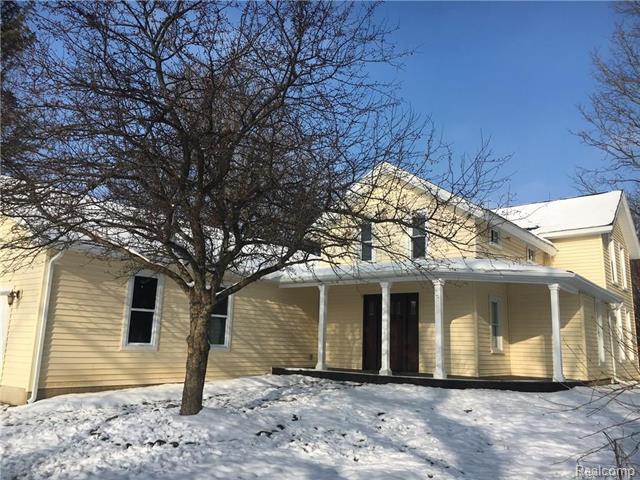 front view picture of 9508 Beardslee Road, Perry, MI. 48872