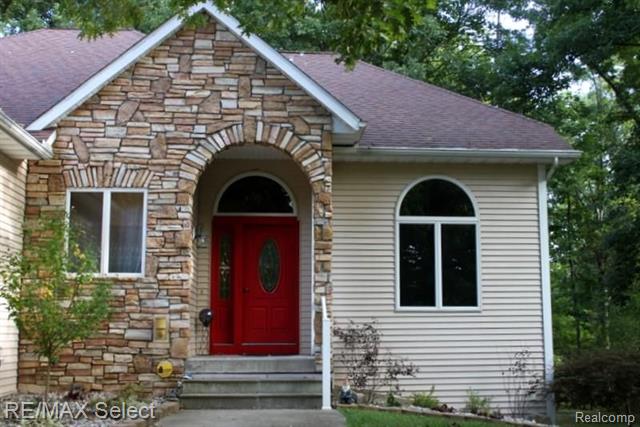 front view picture of 12247 W Coldwater Road, Columbiaville, MI. 48421