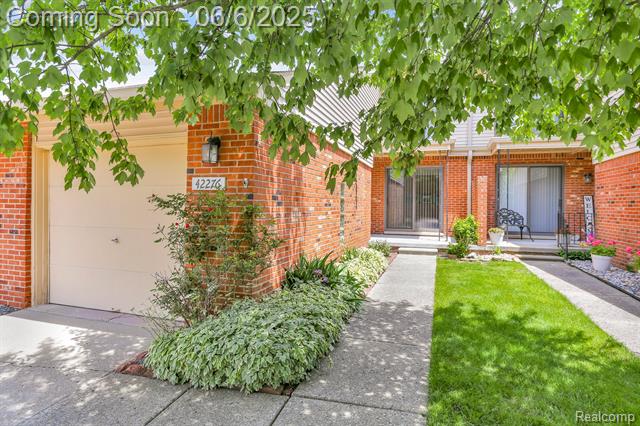 front view picture of 42276 Lochmoor Street, Clinton Township, MI. 48038