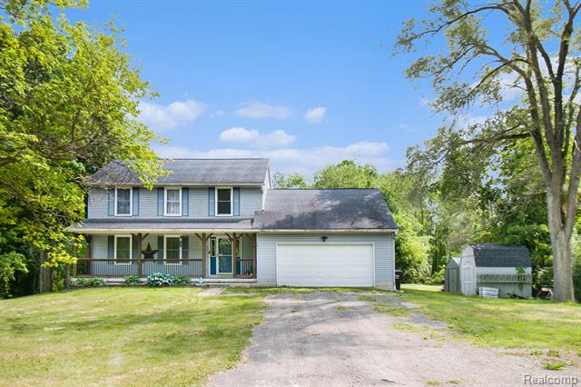 front view picture of 7986 Arkona Rd, Milan, MI. 48160