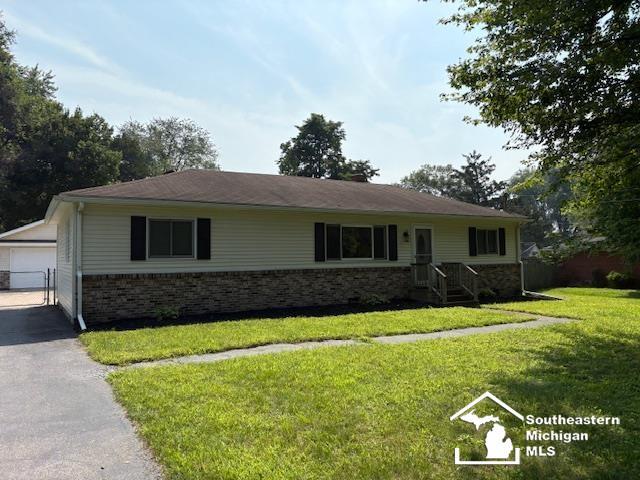 front view picture of 8890 Woodside, Temperance, MI. 48182