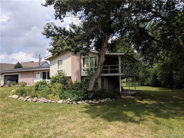 front view picture of 8265 Plymouth-Ann Arbor Road, Plymouth, MI. 48170