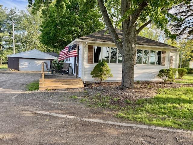 front view picture of 5547 Davison Road, Lapeer, MI. 48446