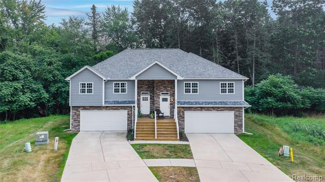 front view picture of 280 Whispering Pines Drive, Fenton, MI. 48430