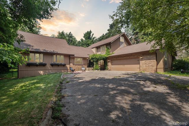 front view picture of 12156 Forest Meadows, Perry, MI. 48872