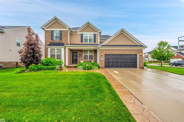 front view picture of 16308 Adelaide Drive, Macomb, MI. 48044