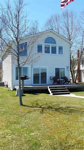 front view picture of 8210 Clarks Cove, Addison, MI. 49220